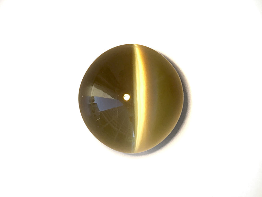 Meet The Chrysoberyl Cat's Eye, A Stone That's Hard To Forget