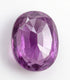 A faceted oval purple gemstone, likely amethyst, photographed on a clean white background.
